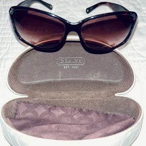Coach sunglasses.  Brown with gold accents.